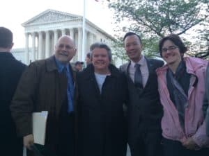 Standing in front of U.S. Supreme Court
